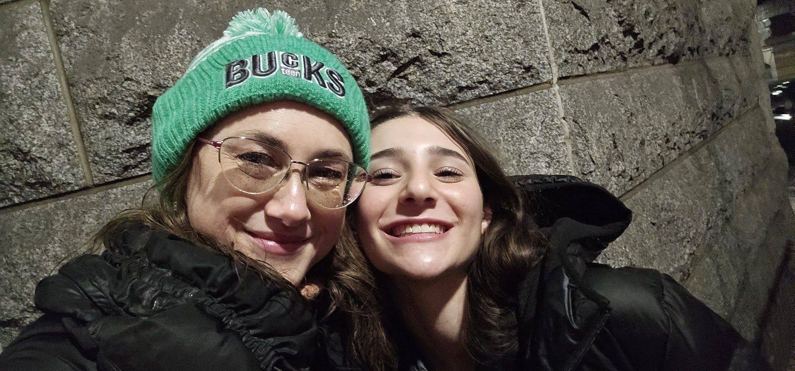 Two CTeen Bucks teens taking a selfie together at an event