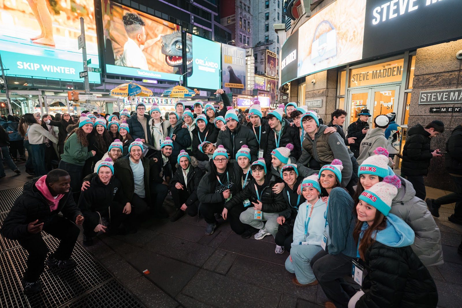 CTeen teens walking through New York City lights during CTeen International